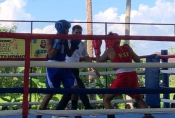 
 **Atlet Tinju Tanah Bumbu, Aditya Darmawan, Raih Kemenangan di POPDA Kalimantan Selatan**