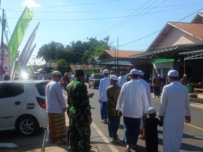
 Wujud Dukungan Kegiatan Keagamaan, Koramil 1002-08/LAU Amankan Haul KH. Mahfuz Amin